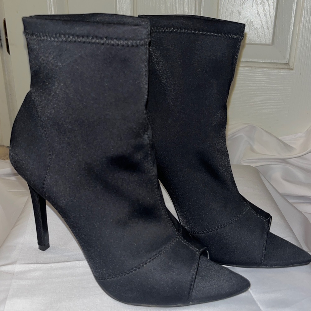 Black stiletto heels with pointed tip